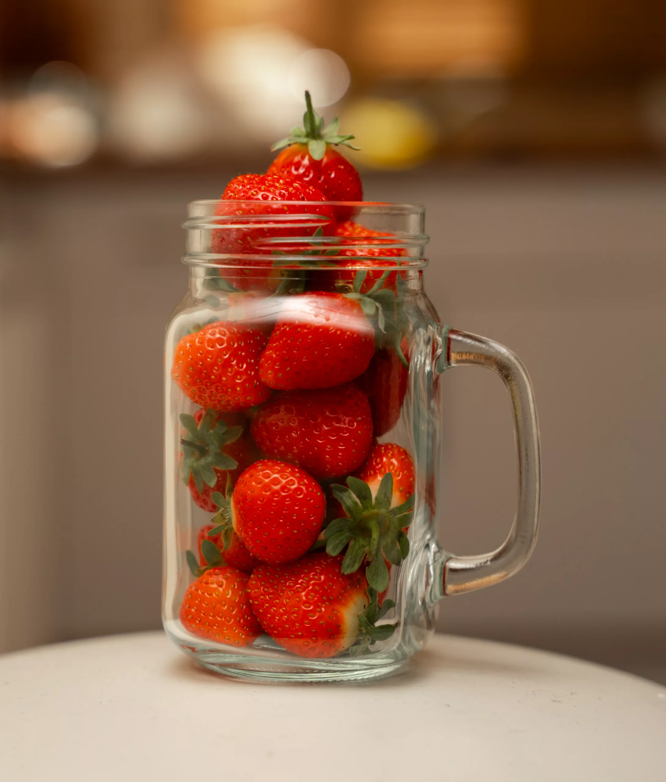 storing strawberries in mason jars
